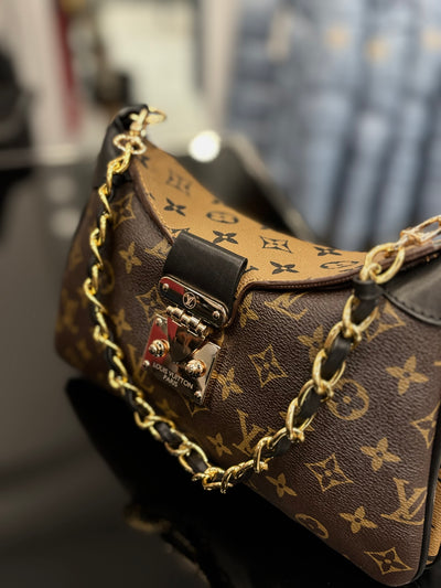 Τσάντα Louis Vuitton brown ωμού/χιαστί