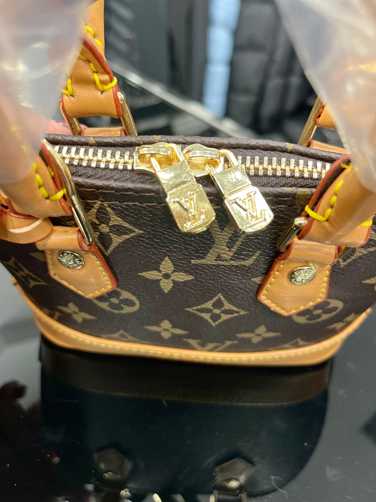 Louis Vuitton Mini Alma Bag