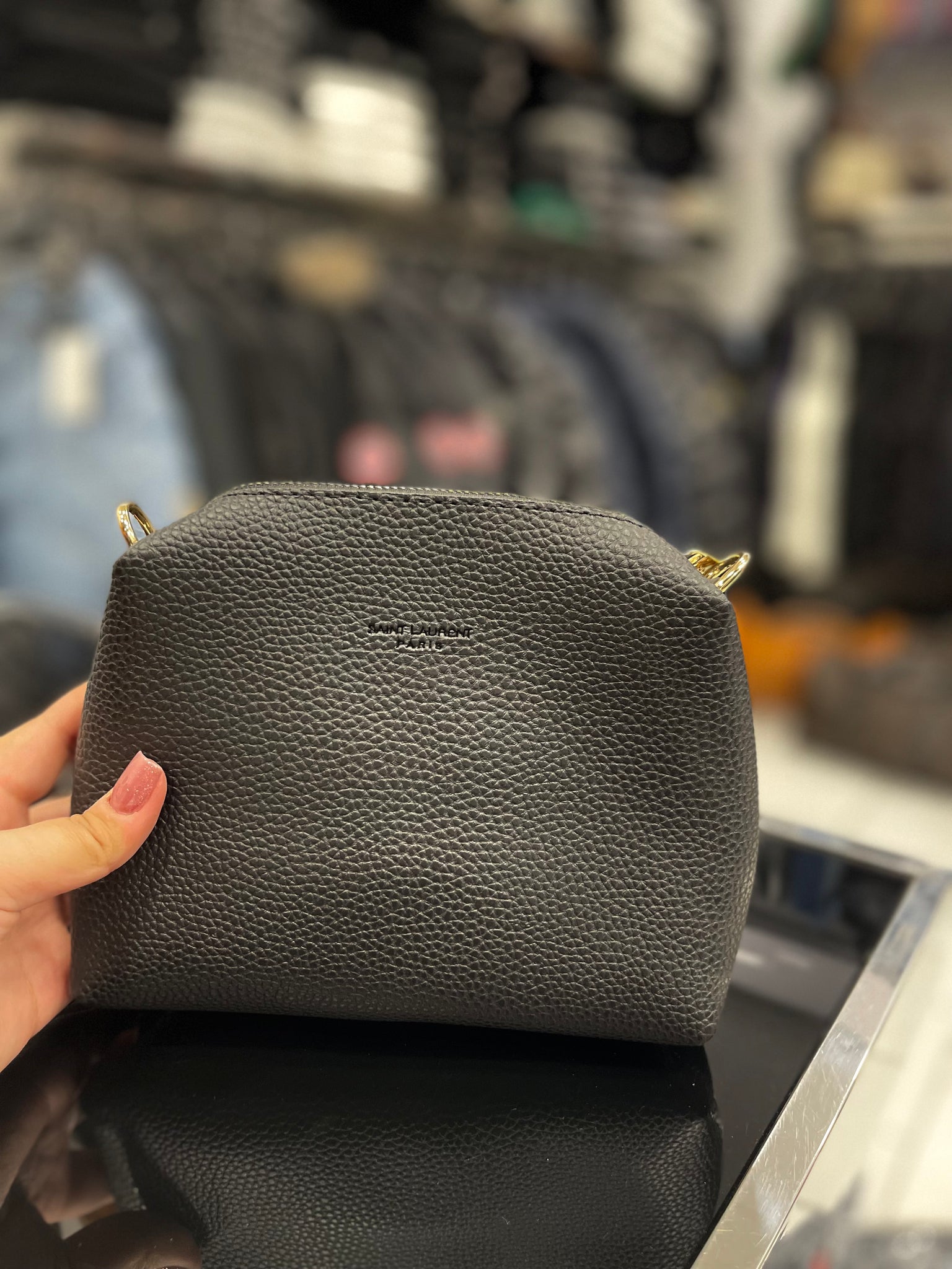 Yves Saint Laurent Le 5 À 7 black bag coming with a pouch