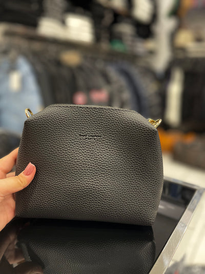 Yves Saint Laurent Le 5 À 7 black bag coming with a pouch