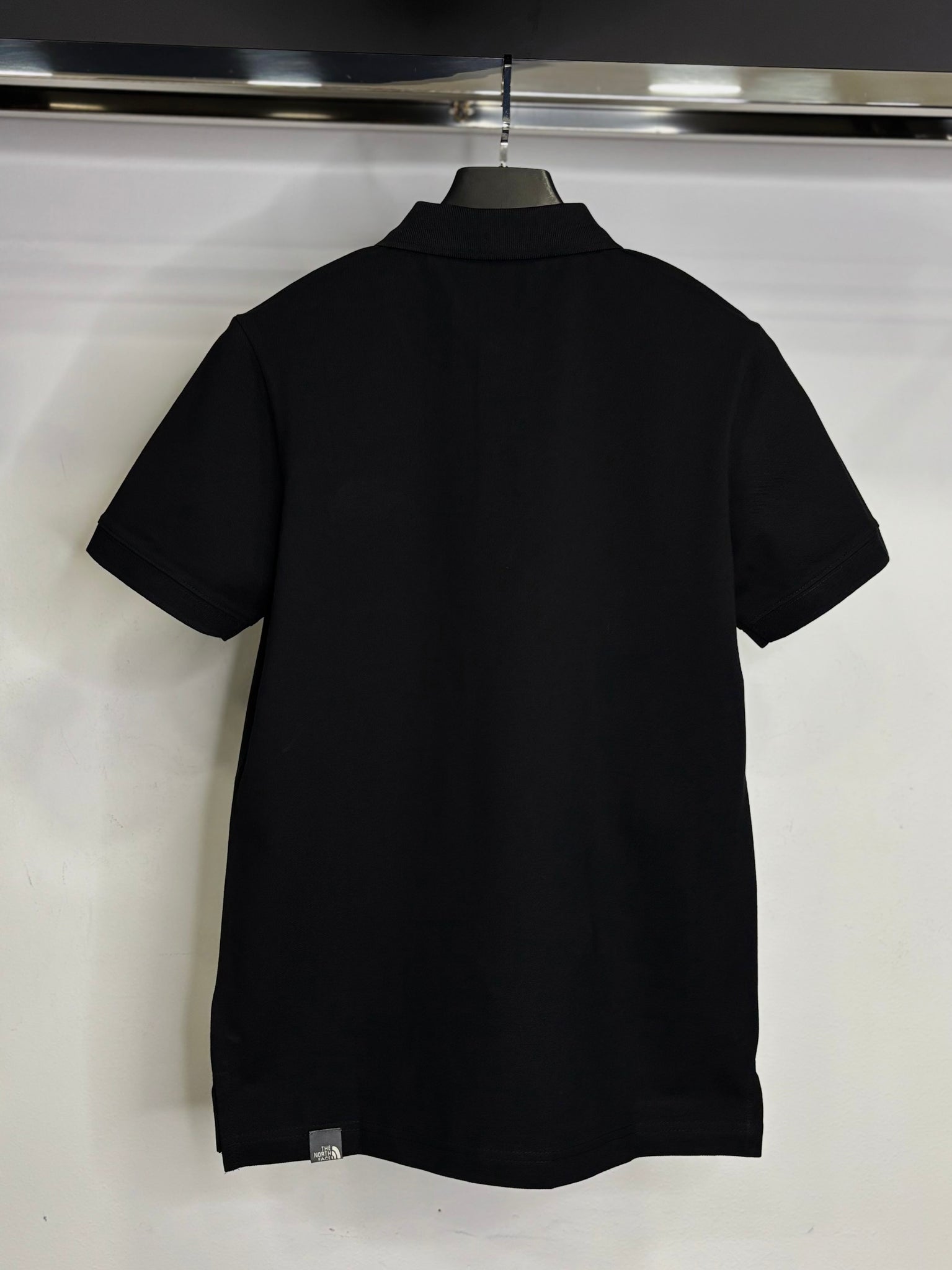 The North Face black t-shirt with collar code