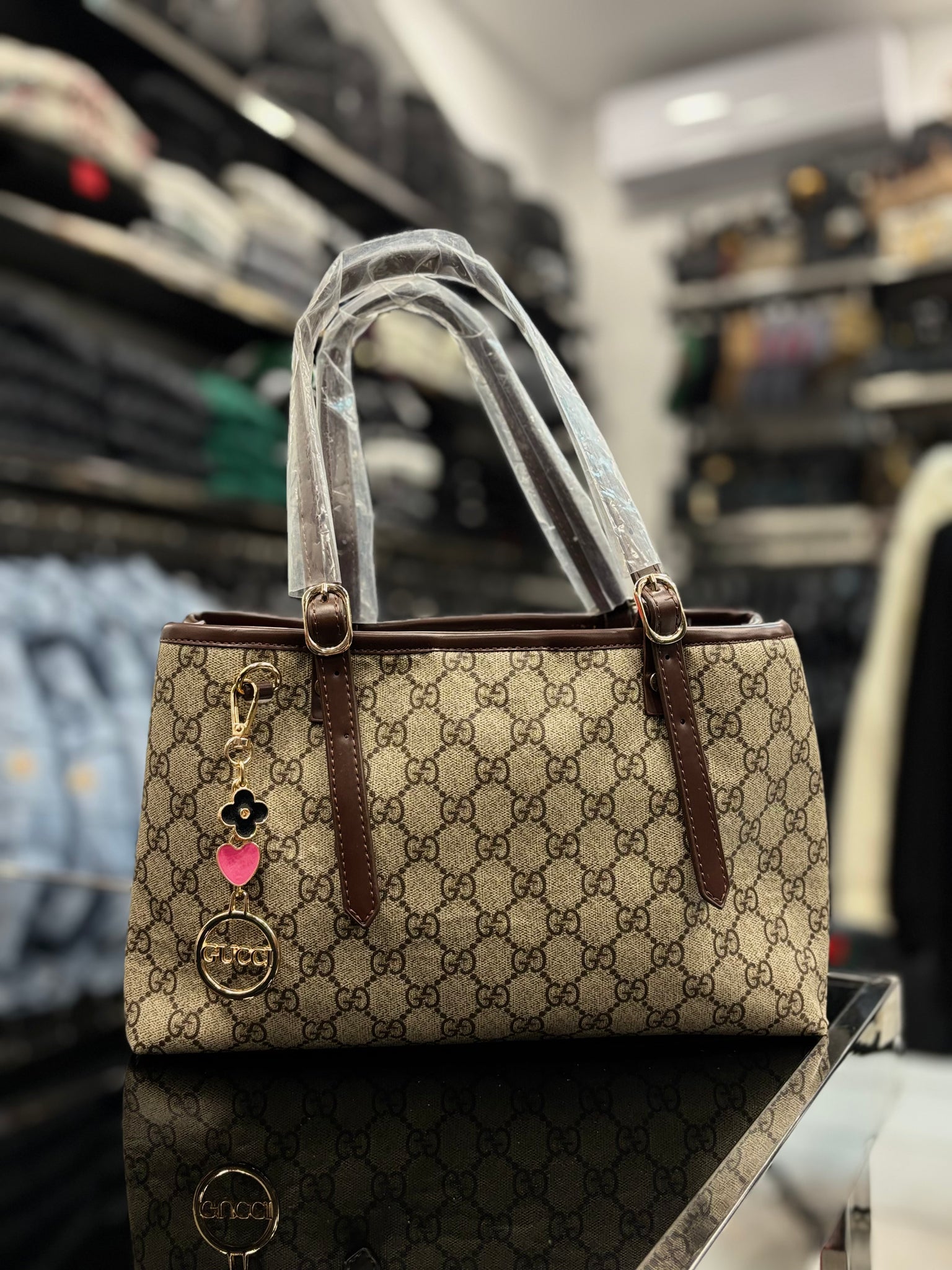 Gucci GG Emblem Tote dark brown bag